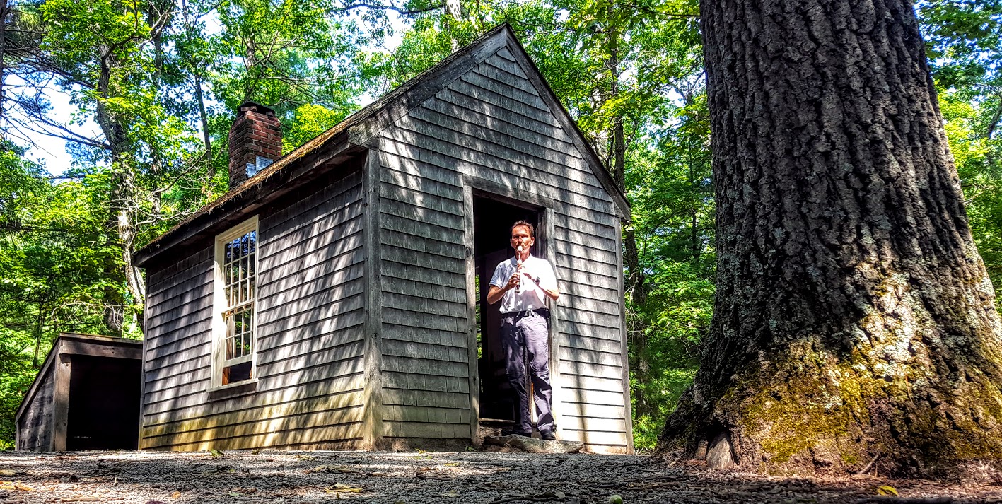 Playing recorder at Walden Pond Thoreau Hut